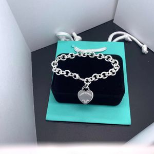 Tiffanybracelet Cross OT en acier inoxydable entre verrouillage grande chaîne en forme de boucle en forme de boucle et bracelet pour femmes