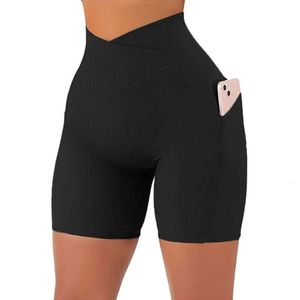 Enveloppe serrée taille fil pantalon de yoga femme croix haute ceinture poche mode Fiess chrysanthème motif short de sport 688ss 2023