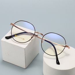 Montures optiques en alliage de titane pour femmes, monture de lunettes tendance pour myopie, rondes en métal plat, confortables pour étudiants, vente en gros