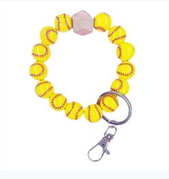 Accesorios deportivos de titanio Diseño mono de moda Pulsera de disco de gramo Llavero Pulsera deportiva con estampado de béisbol de softbol con cuentas de madera 6 colores