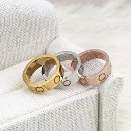 Titane Acier Alliage Argent Bague d'amour Hommes Femmes Rose Or Mode Vis Bijoux Designer Luxe Couple Mariage Promesse Anneaux Cadeau Cjeweler Gros Nail Ring