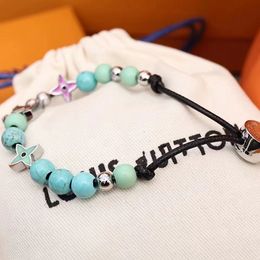 Le concepteur de bracelet en acier titane turquoise peut être des perles élastiques pour les cadeaux d'anniversaire masculins et féminins