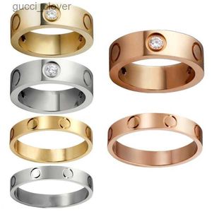 Titane acier Love Ring femmes hommes promettent des anneaux de mariage en or argenté pour les amoureux couple bijoux avec sac à poussière