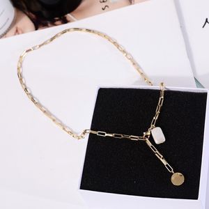 Titane avec de longues chaînes en or 18 carats Collier de perles véritables Femmes Bijoux en acier inoxydable Designer T Show Robe de piste Rare INS Japon Q0531