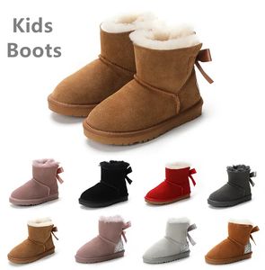 Botas para niños sobre la rodilla Niños Clásico Mini media bota de nieve Invierno Bowknot Piel completa Fluffy peludo Satén Tobillo Preescolar Enfant Niño Niño Niño Niña Niño Tod Botines