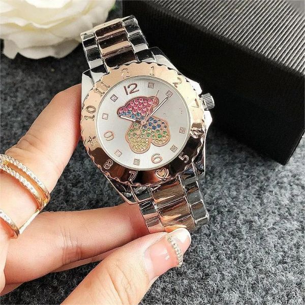 TO Livraison gratuite Luxe US 2024 Montres pour femmes 2023 Rainbow Bear Montres-bracelets pour dames style petit ours bracelet en acier inoxydable couleur or rose 6326 230524