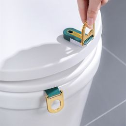 Couvre-sièges de toilette Poignée de levage Élévateurs auto-adhésifs Hygiène Éviter de toucher Tire Anneaux Couverture Flip Dispositif Manipuler la TAB 10.5x2.5cm Vente en gros