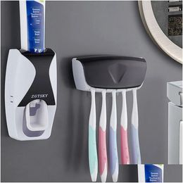 Porte-brosse à dents 2pcs Matic Tootaste Distributeur mural Support anti-poussière Accessoires de salle de bain Set Squeezer Drop Livraison Home Gard Otsfn