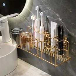 Soportes para cepillos de dientes Estante de almacenamiento para baño Arte del hierro Soporte para cepillos de dientes montado en la pared Lavabo dorado de lujo Organizador de tazas para enjuague bucal Accesorios de baño 231013