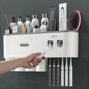 Tandenborstelhouders Magnetische adsorptie Omgekeerde tandenborstelhouder Aan de muur gemonteerde dubbele automatische tandpastadispenserrek Badkameraccessoires 231025