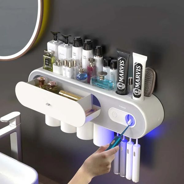 Soportes para cepillos de dientes Soporte automático para cepillos de dientes montado en la pared Exprimidor de pasta de dientes Energía solar Soporte para cepillos de dientes UV Estante de almacenamiento Accesorios de baño 231013