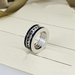 Top 10a Fashion Designer Ring Jewelry Black Blanc Spring Spring Rings For Women Mens Sier Anneaux Saint Valentin Gift 5-12 Taille