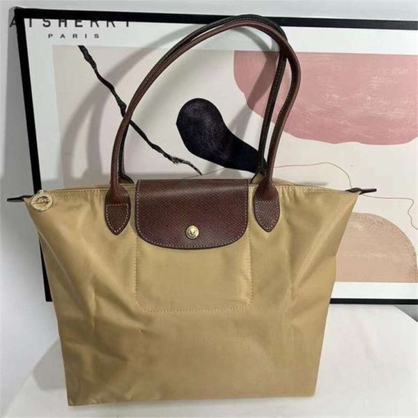 Top 7A Bolsos al por mayor de alta calidad Capacidad de bolsa de compras grande % 90 de descuento en venta al por mayor y tela Bolsa de hombro Tamaño Bolsa de playa Bolsos de diseñador de lujo Monederos de nailon Tasche