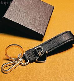 Keeschains de marque Top Brand Sac de mode Pendant Men Femmes Célectorielle Car Key Chain Prad Keyring Designer Leather Metal Keychain High End Lover Keychains Accessoires