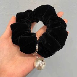 Topontwerper miumiu mode haarlus zwart fluwelen parel grote darm licht luxe luxe luxe luxe kopstring haar valentijnsdag geschenken accessoires juwelen sieraden