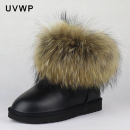 Botas de nieve para mujer de cuero Gneuine de piel grande Natural a la moda, botas de invierno cálidas, tobilleras sin cordones, piel de mapache para mujer