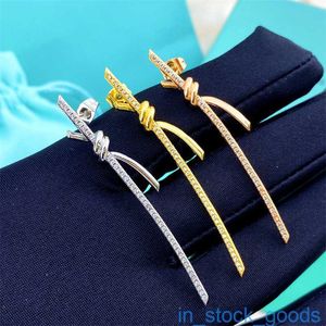 Broupe d'oreille de marque Tifanccy de luxe de qualité supérieure V Boucles d'oreilles à nœud à nœud incrusté en diamant en or pour femmes bijoux de haute qualité de haute qualité