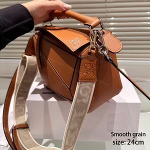 Bolsos de cuerpo de moda de cuero real de primer grado para mujeres rompecabezas de diseñador bolsos de mango de mango de diseño con dos correas