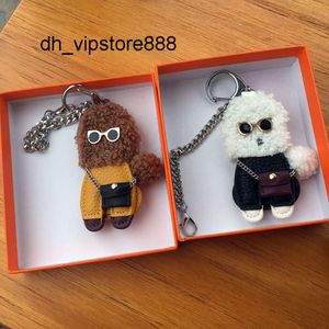 Top Llaveros Versión coreana del pequeño y creativo bolso de peluche, adornos colgantes, llavero de coche, regalos hechos a mano para amantes de los perros de peluche