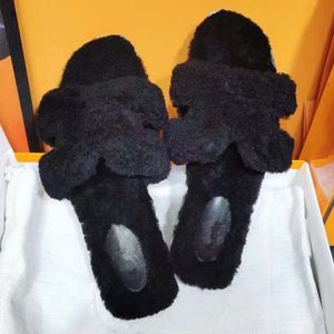 Top dames wollen schapenvacht winter slipper bont een stuk lam wol warme en comfortabele slijtvaste rubberen platte slippers 35-41 met doos