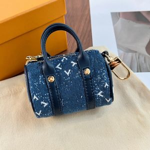 Top Luxury Designer Mini Denim Oreiller Sac Pendentif Sac accessoire avec porte-clés Peut être accroché à la ceinture ou au sac à main Étui pour écouteurs Étui pour clé de voiture Porte-monnaie pour femme