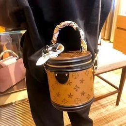 Top luxe qualité sac à bandoulière Designer sacs vente Discount en cuir véritable sacs à main sac à main femmes Cannes mode baril en forme de fleur dame Ha