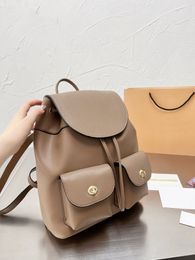 Bolsas de primera calidad Mujeres Diseñador de cuero genuino Mochilas de lujo New York Bolso Shouder Bag Moda Solo Mochila de viaje Bolsa Perilla Interruptor Tamaño 32 cm