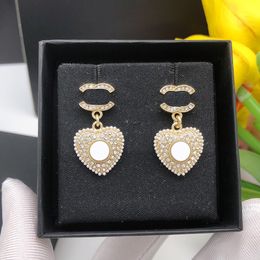 Top qualité grands coeurs boucles d'oreilles design v-gold boucles d'oreilles en or 18 carats pour femmes boucles d'oreilles classiques senior nouvelles boucles d'oreilles trèfle