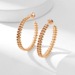 Top qualité dupe marque 925 en argent Sterling bijoux de mode rivet boucles d'oreilles pour les femmes