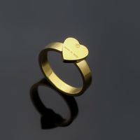 Extravagant Simple Heart Love Ring Gold Silver Rose Couleurs en acier inoxydable Couple de couple Fashion Women Designer Jewelry Lady