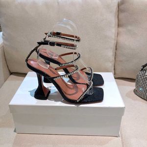 Topkwaliteit Gilda glitter sandalen 100 mm kristallen verstrikte riem spool hakken torenhoge hiel voor vrouwen zomer luxe ontwerpers schoenen feest
