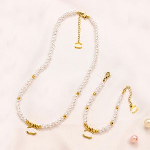 Les ensembles plaqués en or de qualité supérieure ne se fanent jamais la marque de marque créatrice bracelet en acier inoxydable collier imitation de mariage bijoux de mariage en perles