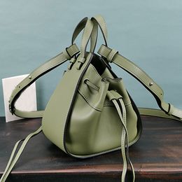 Topkwaliteit hammoc k mini tote tassen touw emmer tassen Spaanse stijl cowhide handtassen nieuwe modieuze schouder crossbody tas draagbaar lo