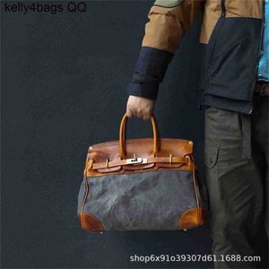 Handtas van topkwaliteit Kop Laag Koehide handgemaakte buitenzak Leer Splicing 5A Kwaliteit Handswen Medium Leather Forqq Logowith Logo QQ