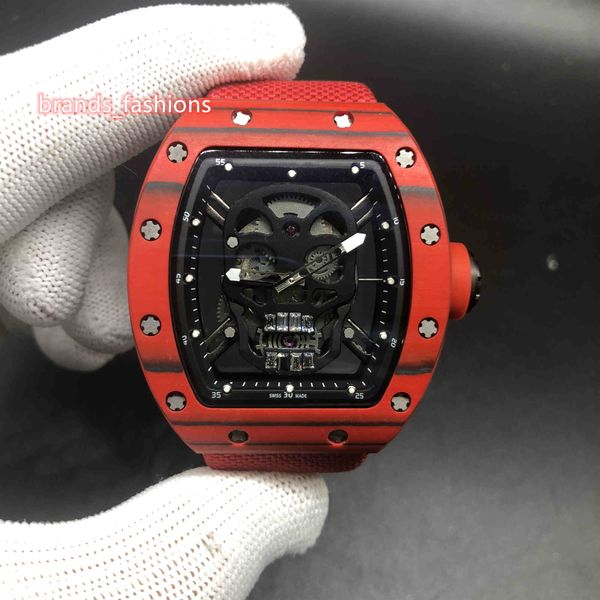 Top qualité hommes offre spéciale montres rouge boîtier en Fiber de carbone montre creux visage rouge bracelet en Nylon automatique mécanique montre-bracelet