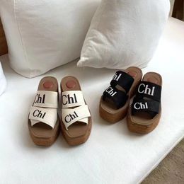 Topkwaliteit platform sandaal slipper plat klomp muilezels designer schoenschuifregelaars dames mannen cadeau mode mode houtachtige zomers casual zwart witte glijbaan meisje strand canvas dame