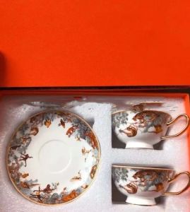 Taza de café de porcelana de alta calidad y platillo taza de huesos de china Mosaico de diseño de mosaico en tazas de té de oro y saucersset
