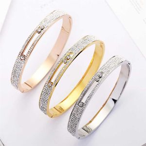 Calidad superior Oro rosa Hueco Cristal Acero inoxidable Amor Hombres Mujeres Diapositiva Zircon Carter Brazalete Brazalete Pulsera San Valentín Q0717276b