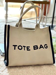 Top Quality Tote Bag Designer Totes Femmes Sacs à main Nylon Toile Cuir Outfit Bandoulière Sac à provisions Grand Casual Beach Sacs à bandoulière Sacs à main Noir 3 Taille