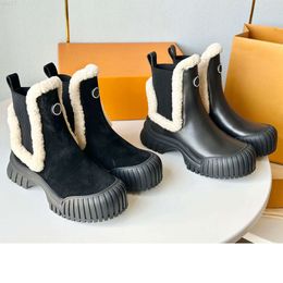 Botas de esqui Top Ruby Flat Ankle Boot 1AC7AR versão invernal vem em couro de bezerro camurça com acabamento em shearling fofo assinado com um círculo na frente Botas de luxo 34 42