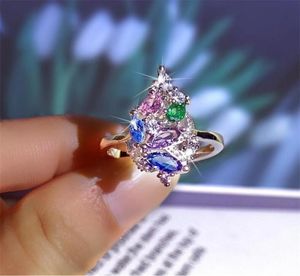 Venta superior Joyería de lujo Plata de ley 925 Multi Color Marquse Cut 5A Cubic Zircon Eternity Mujeres Boda Anillo de banda de flores para Lo1318978