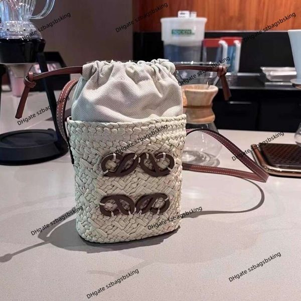 Top bolso de mujer bolso tejido de paja francés cartera para teléfono móvil Lowe 2023 nuevo mini bandolera de un hombro pequeño bolso de cubo a la moda