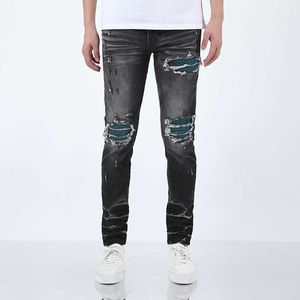 TOPONAMIRI Brand à tendance Black Bull Washed et usé Patchwork MX1 Elastic Slim Fit Jeans Mens High Street Instagram