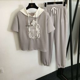 Tops Robes pour femme 2023 Nouvel ensemble Polonté à manches à manches courtes brodées pour femmes polyvalentes Pantalons décontractés