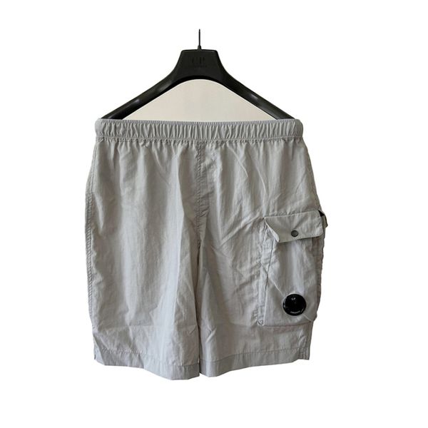 Topstoney 2024 Nouvelle marque de mode Shorts Bouton Décoration Designer Hommes Métal Nylon Shorts Mode High Street Sports Shorts Maillot de bain à séchage rapide Pantalons de plage pour hommes