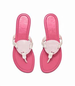 Sandalias de Torybutch Sandalias para mujeres Tori Sandalia de abedules de cuero genuino zapatillas para mujeres de verano zapatillas de lujo de lujo hueco sandalias de playa para mujeres 857