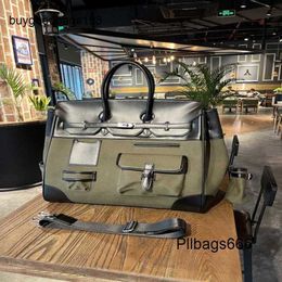 Sac fourre-tout Cargo Hands Handmade 7a 2024 Nouveau bagage à main polyvalent de banlieue avec une capacité accrue pour le voyage de courte distance à la mode.