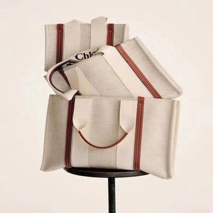 Sac fourre-tout Crossbody Sacs de créateurs Sacs à main de luxe Sacs à bandoulière Luxurys Woody Beach Shopping Sac Femmes Portefeuille Duffel Toile Grands sacs de dame Pochette Sacs à main en lin