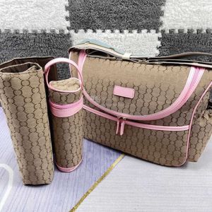 Bolsa de asas Diseñador Bolsas de pañales Mochila con cremallera Moda Mamá Bolso multifunción Lienzo Cerrojo Cuero Hombro Crossbody Bolsos Maternidad Necesidades