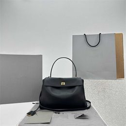 Sac fourre-tout haute définition 24s en cuir d'origine Redeo lâche et paresseux en or noir grande capacité commut les femmes crossbody simples